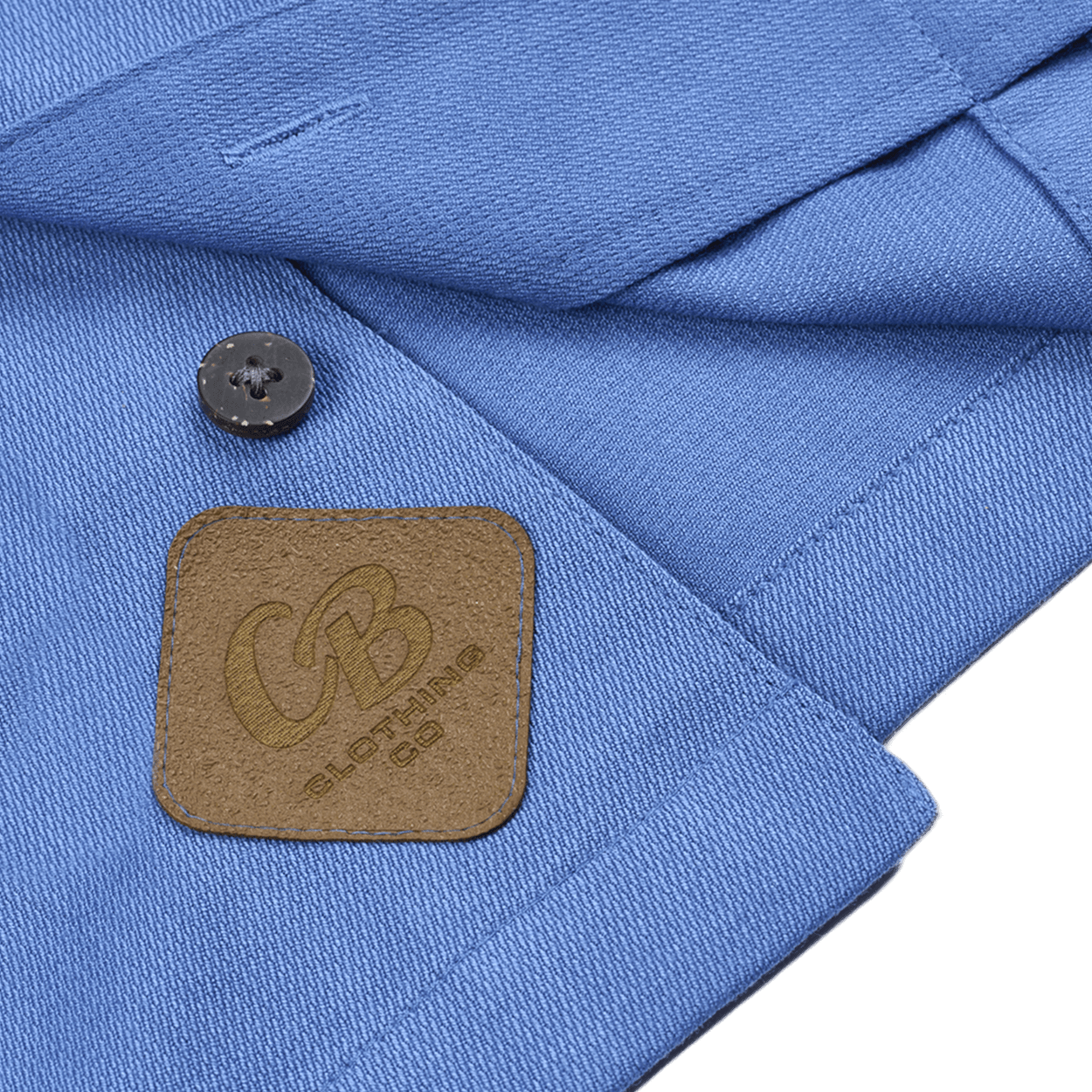 Detailed view of the Gripp-Tac Patch on the ocean blue ribbed camp shirt