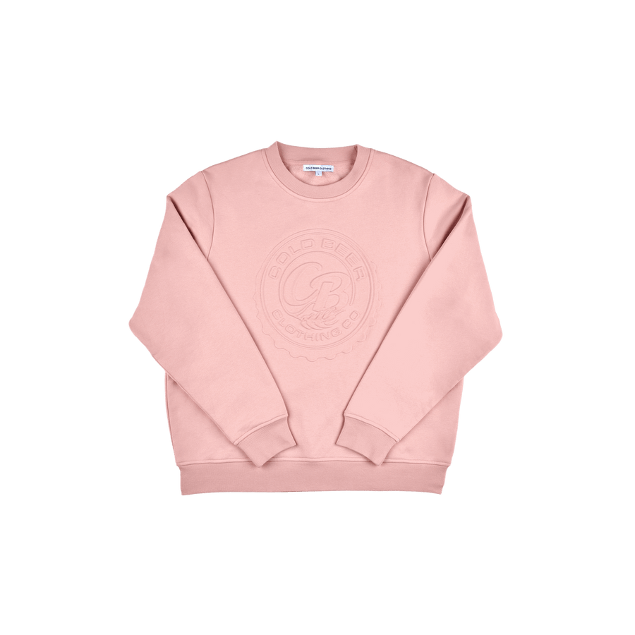 Women's pink sweatshirt showcasing its relaxed fit and soft fleece interior.