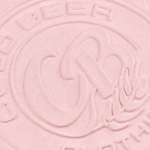 Close-up of the 3D embossed bottle cap logo on the comfort color sweatshirt