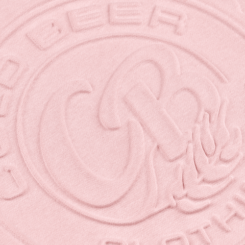 Close-up of the 3D embossed bottle cap logo on the comfort color sweatshirt