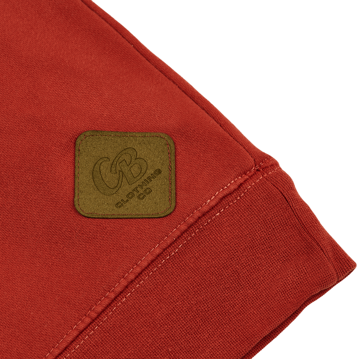 Detailed shot of the Gripp-Tac Patch on the beer crewneck, showcasing its functional grip