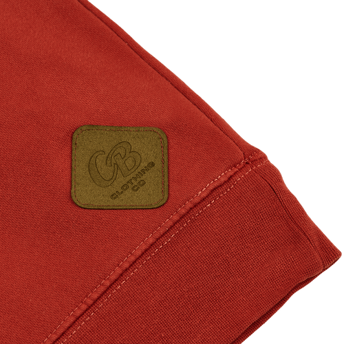 Detailed shot of the Gripp-Tac Patch on the beer crewneck, showcasing its functional grip