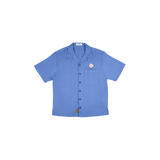 Full view of the ocean blue shirt, featuring a camp collar and breathable ribbed fabric for a comfortable fit