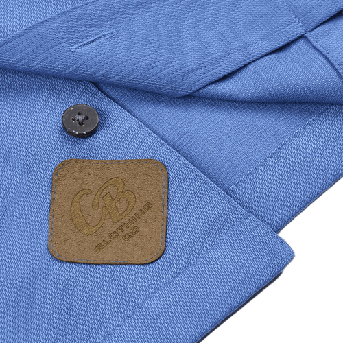 Detailed view of the Gripp-Tac Patch on the ocean blue ribbed camp shirt