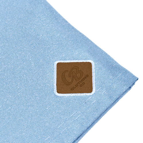 Detailed shot of the Gripp-Tac Patch on the men’s light blue quarter zip sweater for added grip and functionality