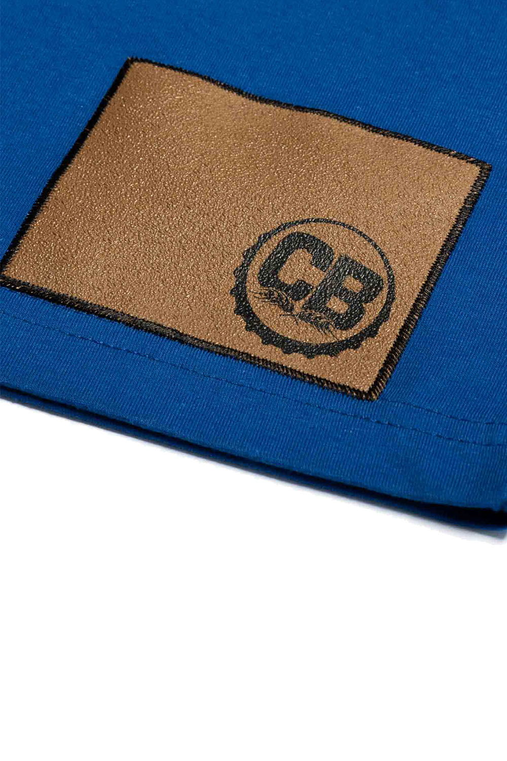 Cold Beer Clothing Heroic Tee Royal Blue Color Up Close View Of Gripp-Tac Patch