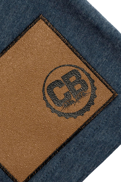 Cold Beer Clothing Original Logo Tee Heather Navy Color Close Up View Of Gripp-Tac Patch